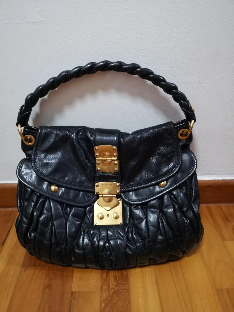 Miu coffer matelassé on sale nappa leather handbag