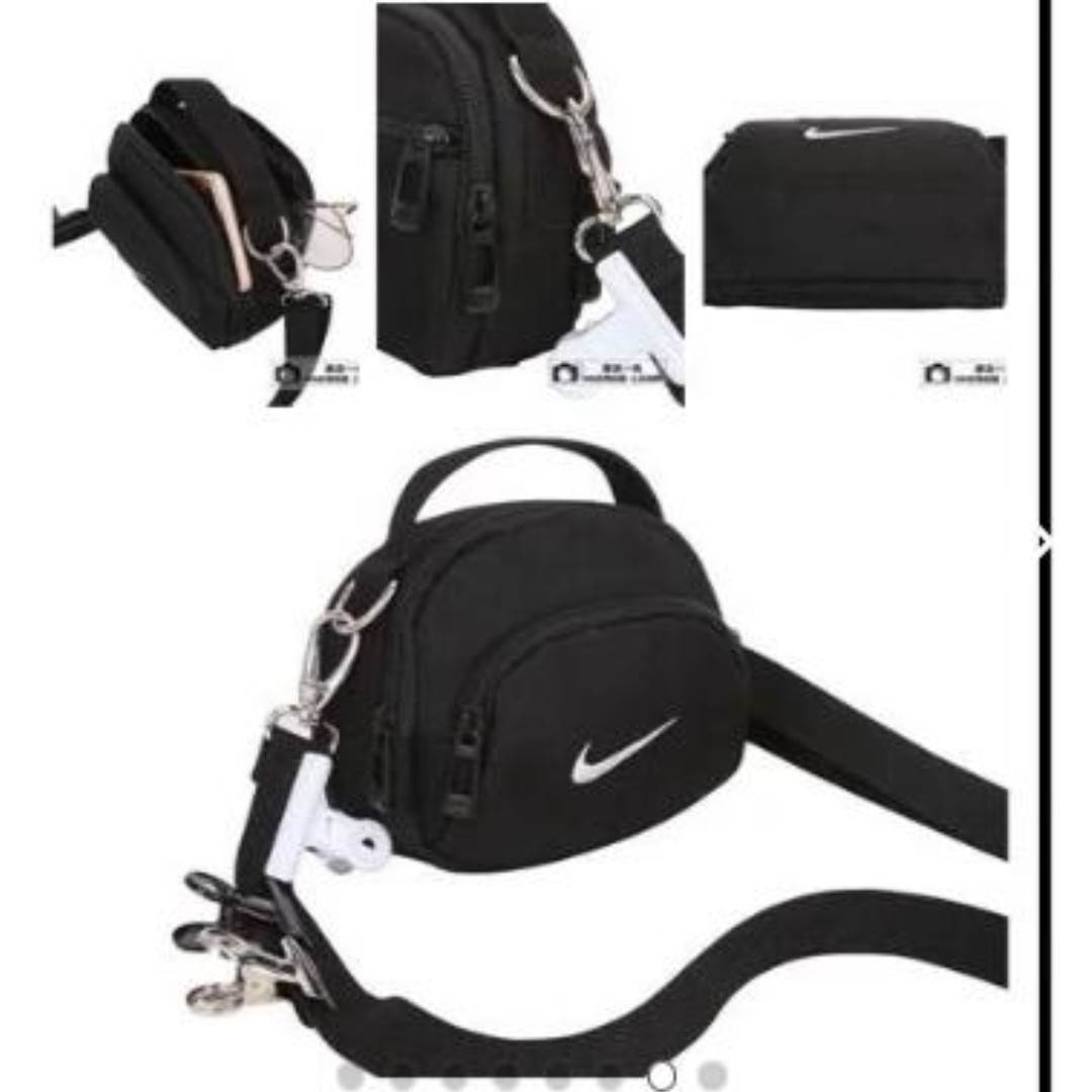 black nike bag with white tick