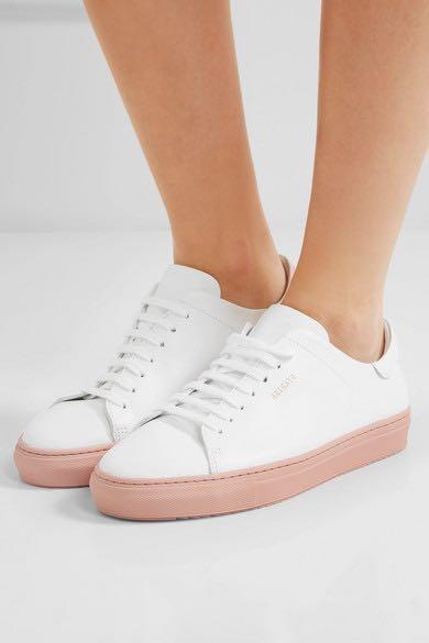 axel arigato pink sneakers