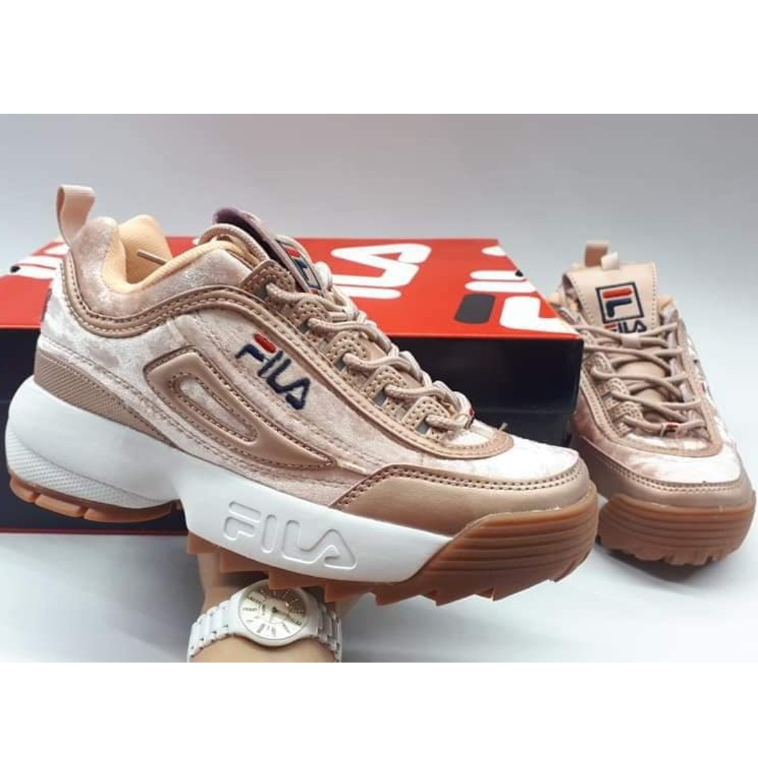 gold fila trainers