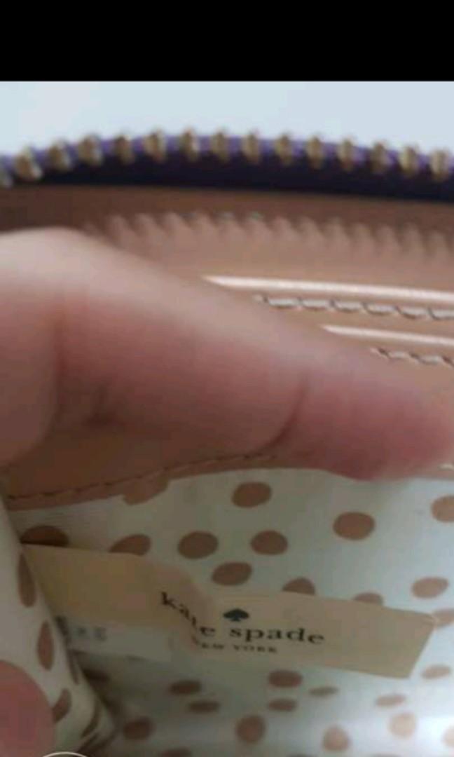 Kate Spade Long Purple Wallet (Category: Luxury Bags & Wallets) located in Paranaque City. Submitted by trishalmgo (Listing ID 215749838, Image 3). Description: Long wallet Outside looks new One card pocket has ink stains (please see pic).