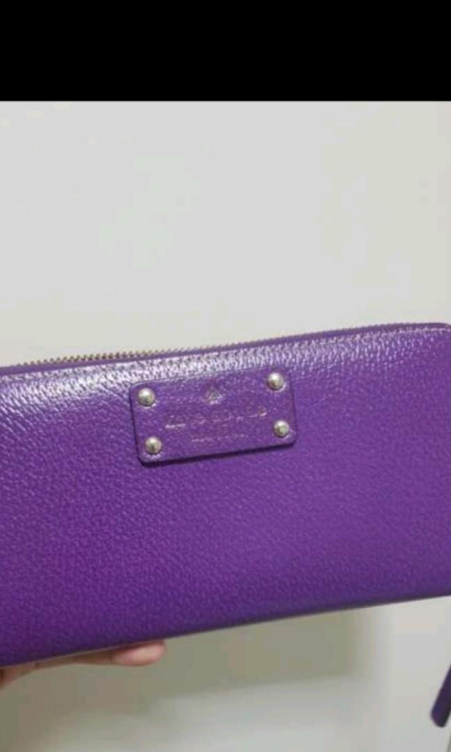 Kate Spade Long Purple Wallet (Category: Luxury Bags & Wallets) located in Paranaque City. Submitted by trishalmgo (Listing ID 215749838, Image 2). Description: Long wallet Outside looks new One card pocket has ink stains (please see pic).