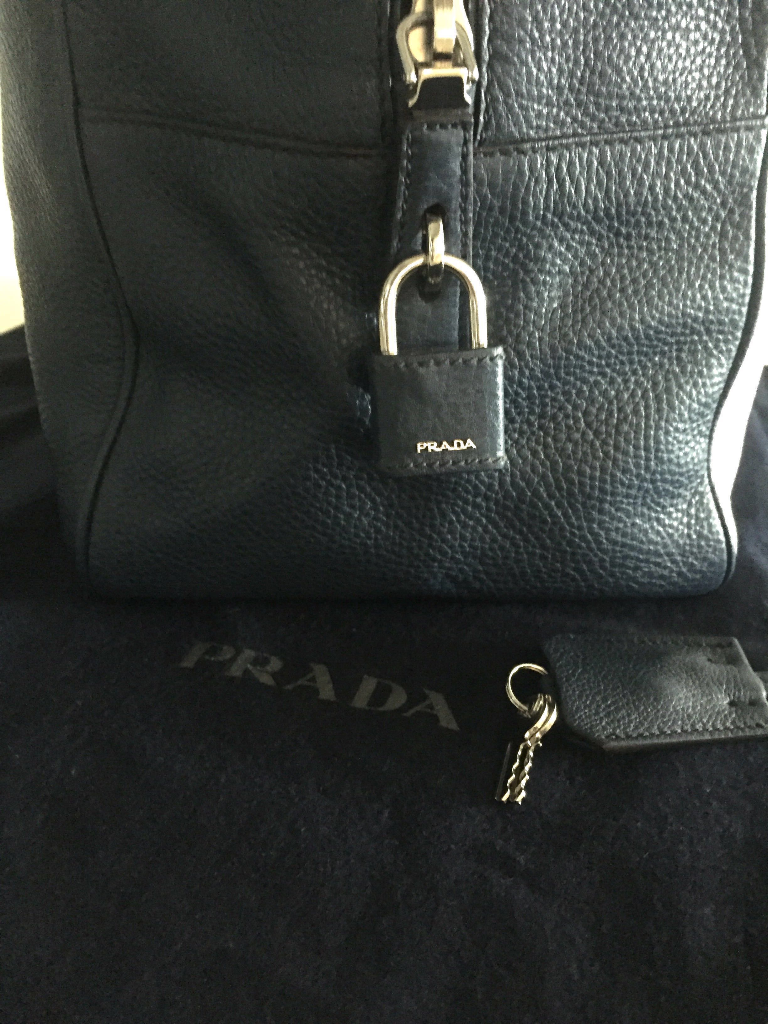 Prada leather travel bag/ Boston, Luxury, Bags & Wallets on Carousell