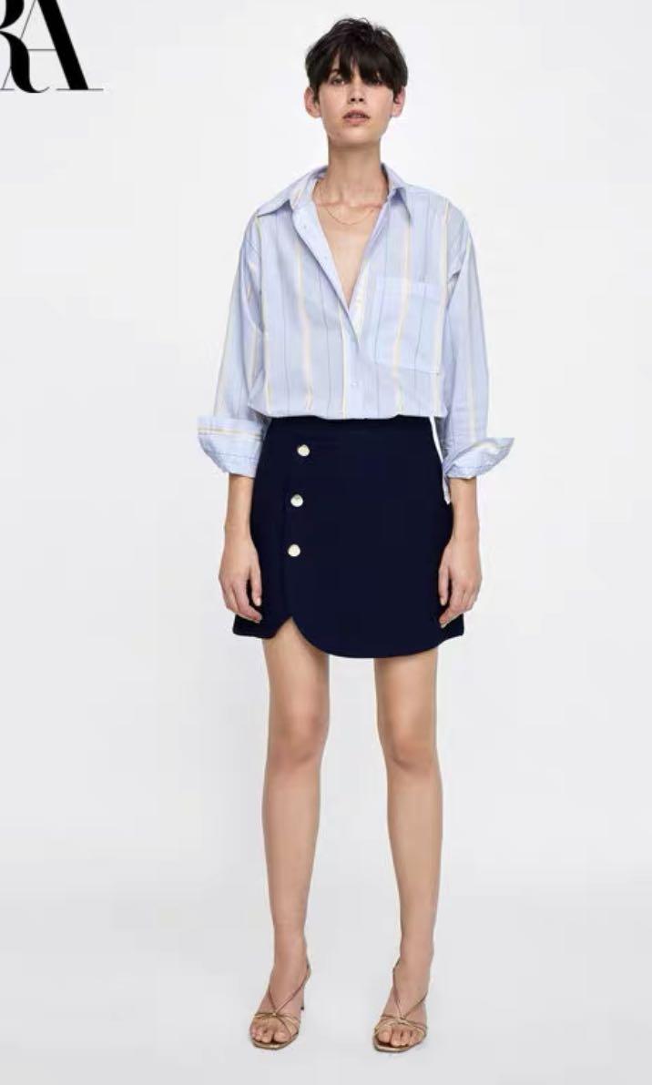 navy skirt with gold buttons