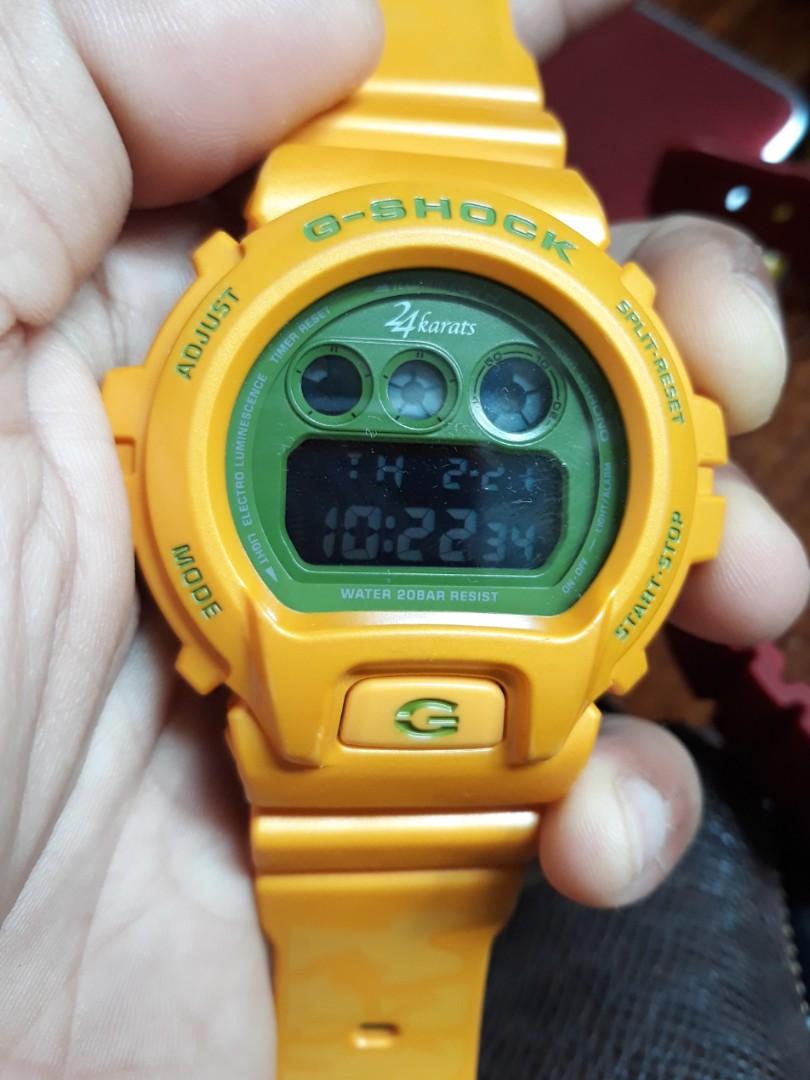 G shock store 24 karat kuning
