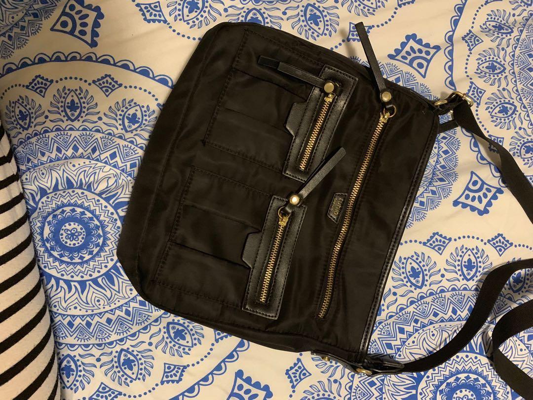 Tutilo sling hot sale bag