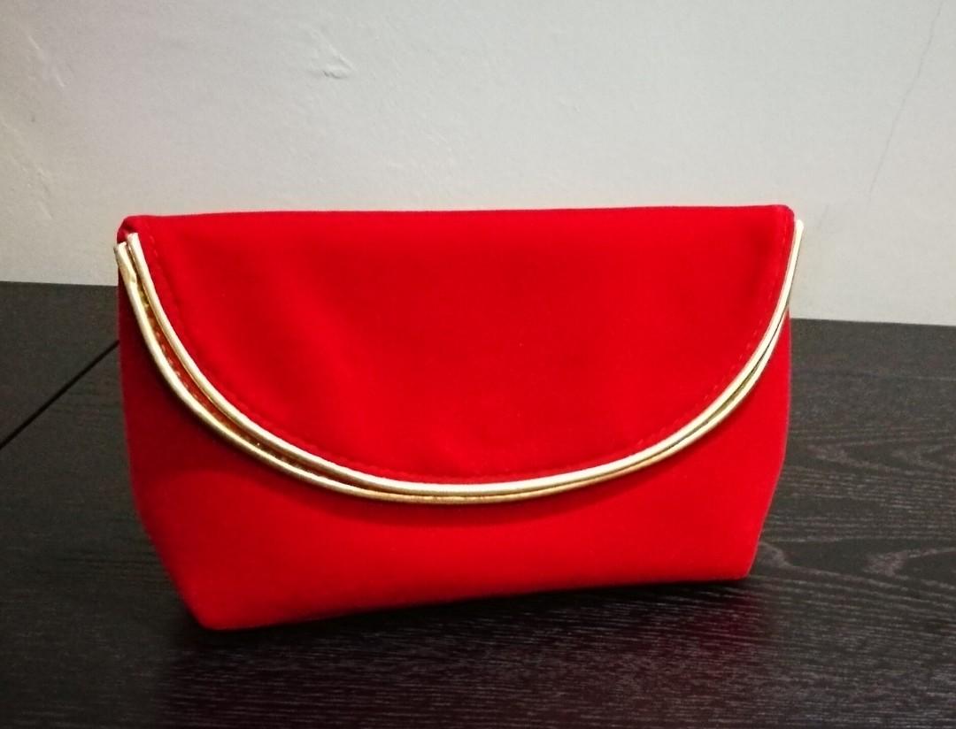 Red faux deals suede clutch bag