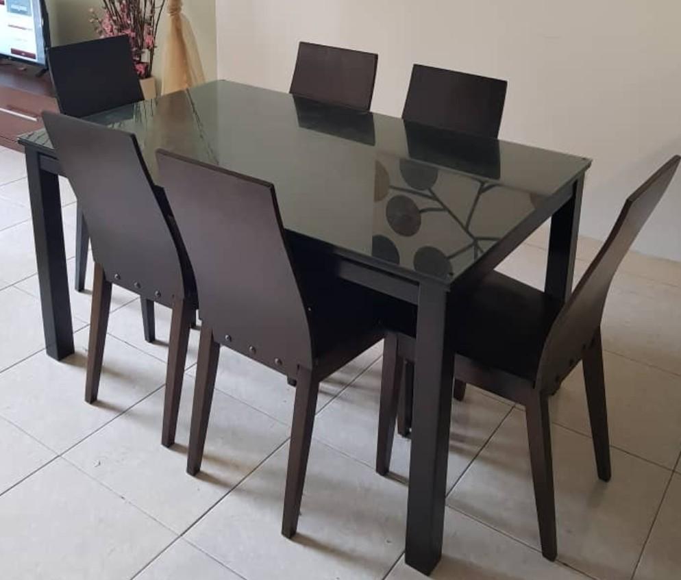 Dining Table Set (Category: Chairs) located in Petaling Jaya. Submitted by anys0601 (Listing ID 216446756, Image 1). Description: Dining Table for 6 person Solid wood and can withsand heavy load Black glass table Selling cheap due to renovating house soon.