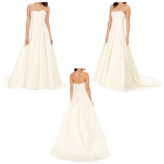 Nicole Miller Laurel Faille Wedding Gown (Category: Evening dresses & gowns) located in Taguig. Submitted by panicxitsxjim (Listing ID 131734529, Image 1). Description: Brand: Nicole Miller Condition : Brand New, fitted only Original price is 55,000 pesos, selling it for only 18,000 pesos Complete with tags and case *has tiny stain but not visible RFS: spare bridal gown #everyonewins.