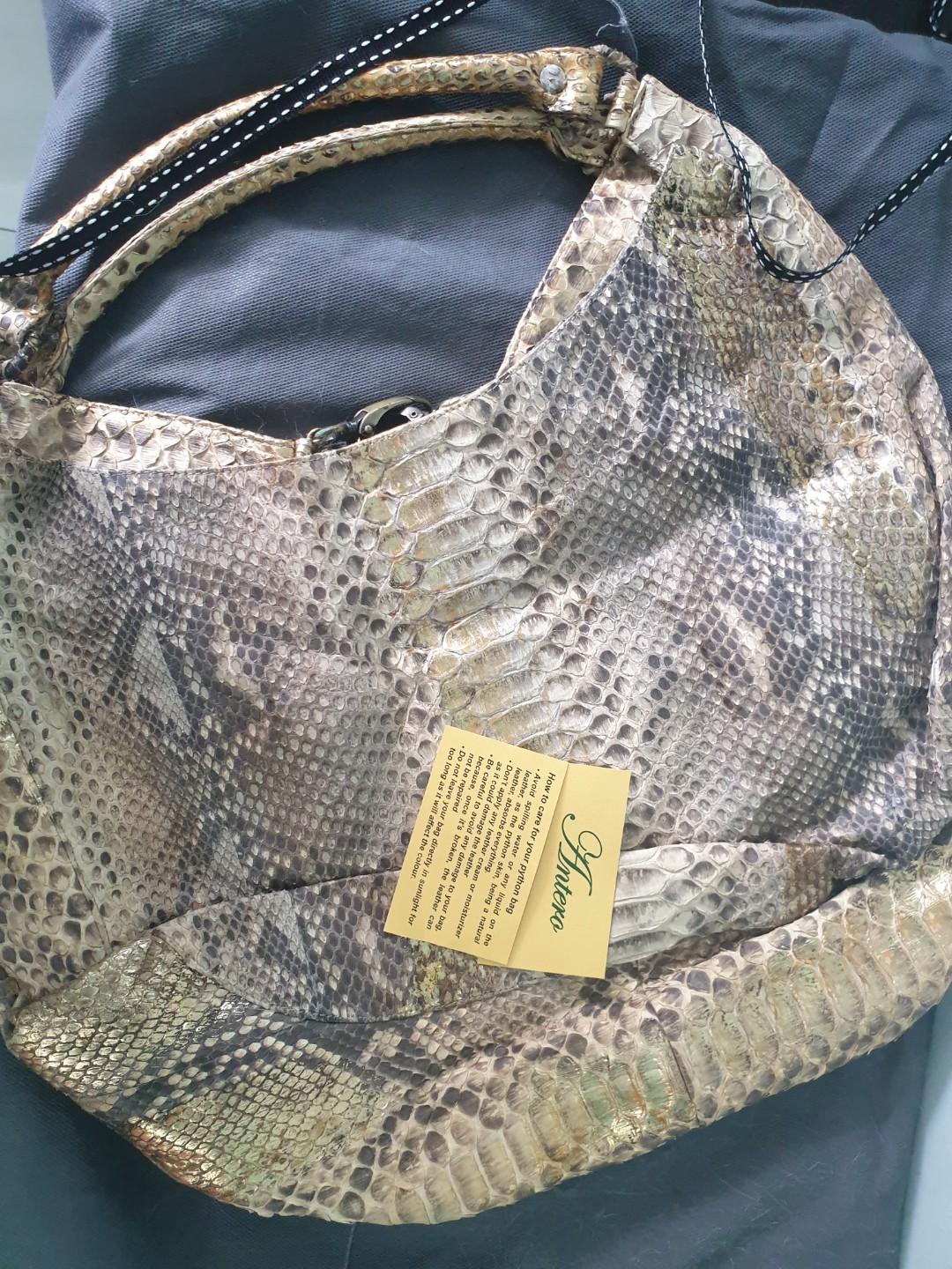 Authentic Python Skin Handbag (Category: Bags & Wallets) located in Singapore. Submitted by eqotrove (Listing ID 216682559, Image 2). Description: 100% AUTHENTIC PYTHON SKIN HANDBAG Used ONLY Once Bag Still is GOOD condition Dust bag is in bad condition due to storage DM me the location and price :).