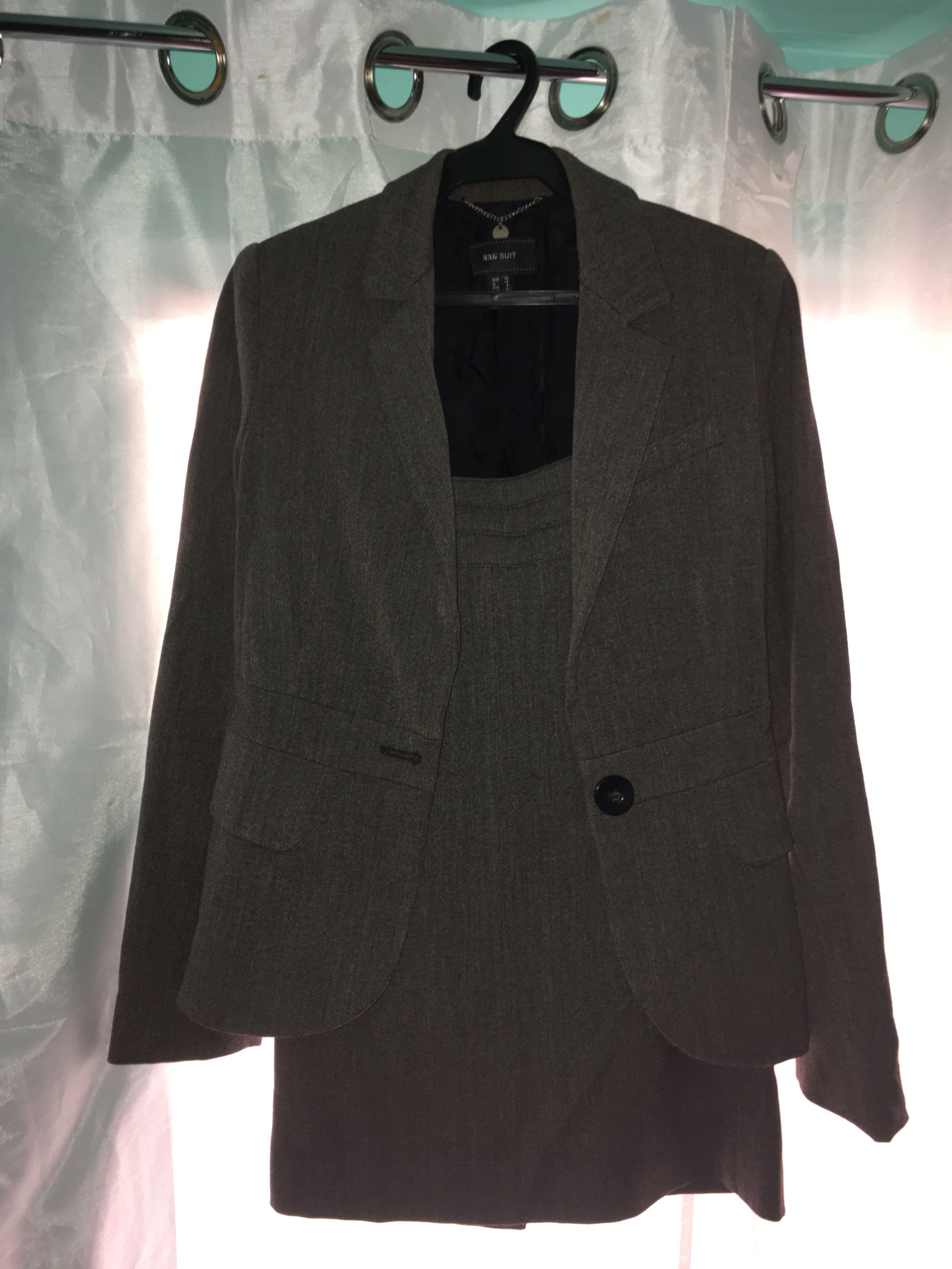 Business suit (Category: Jumpsuits) located in Paranaque City. Submitted by conrich (Listing ID 216697877, Image 3). Description: Skirt and business jacket pair. Hardly worn. Not my size..