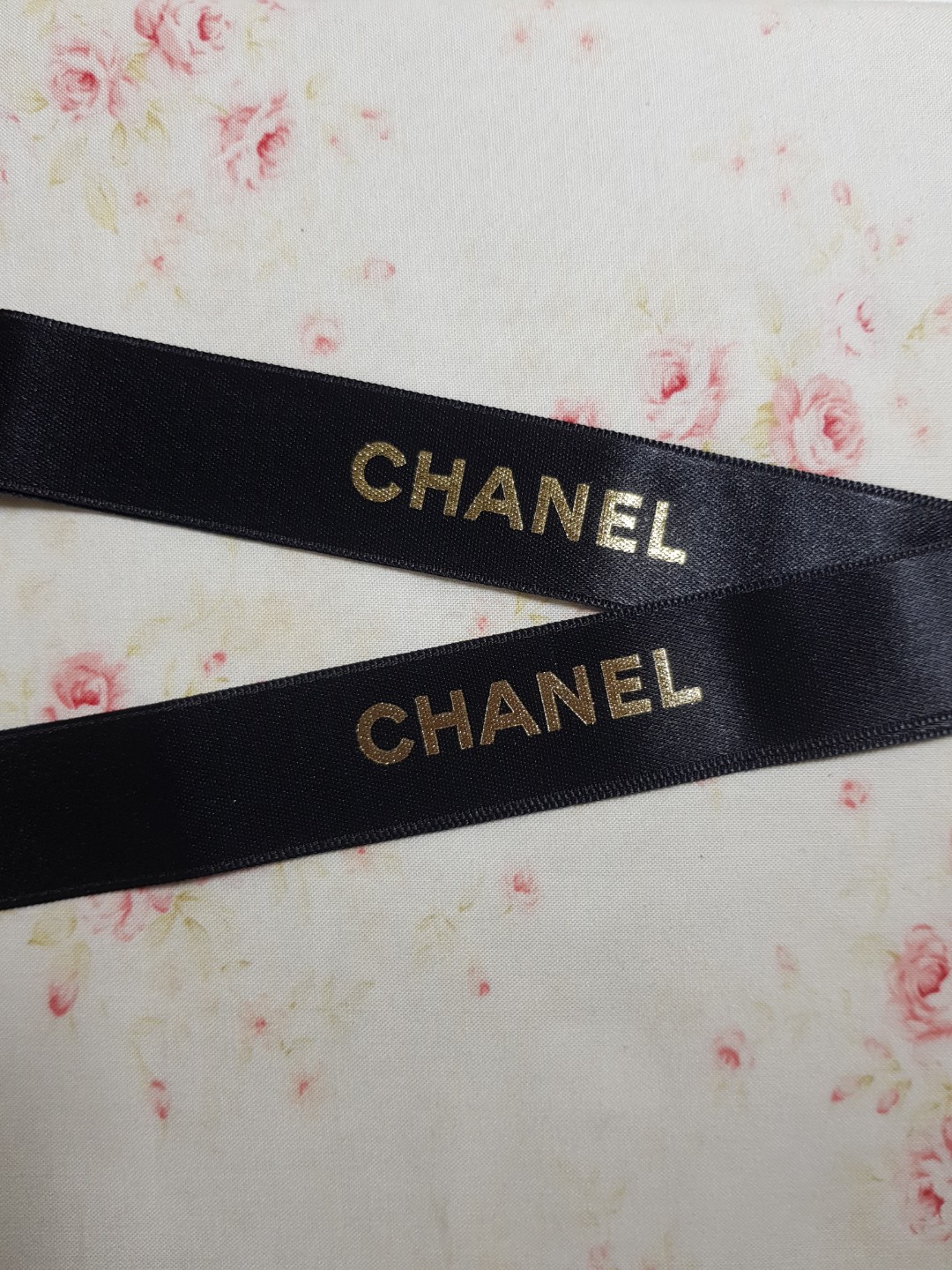 Authentic Chanel ribbon in black with gold wordings
