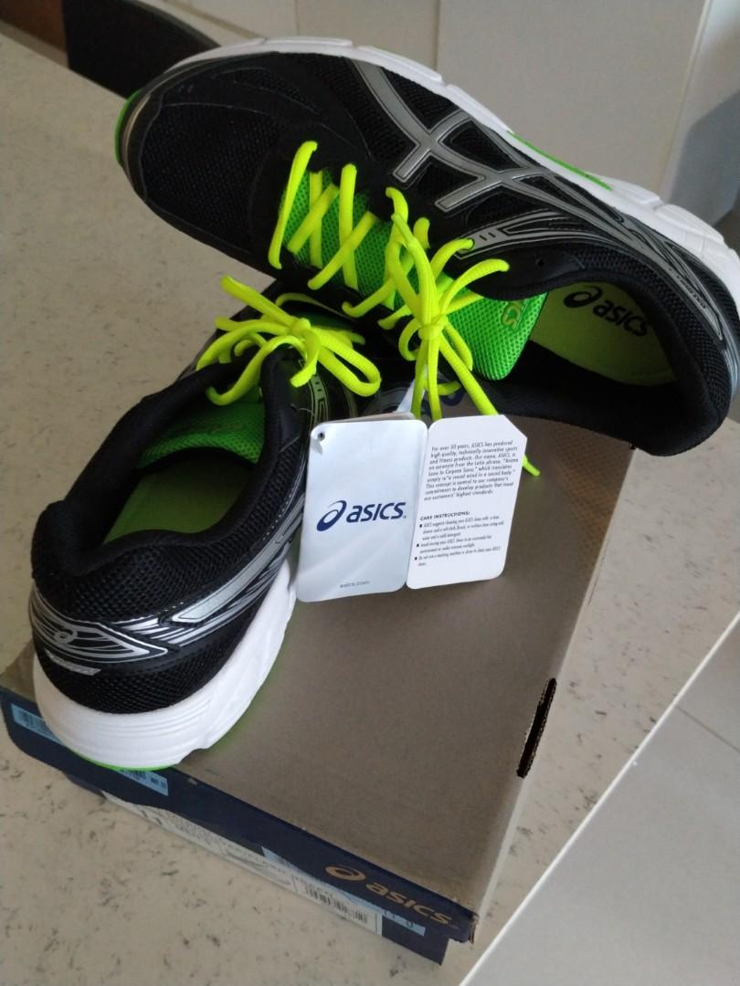 black and lime green tennis shoes