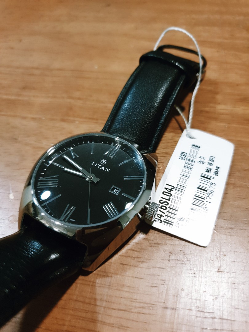 Titan watch cheap 9476sab price