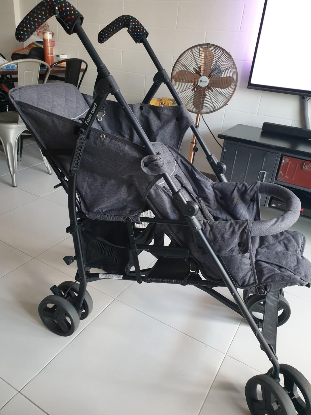 Twin stroller umbrella fold store