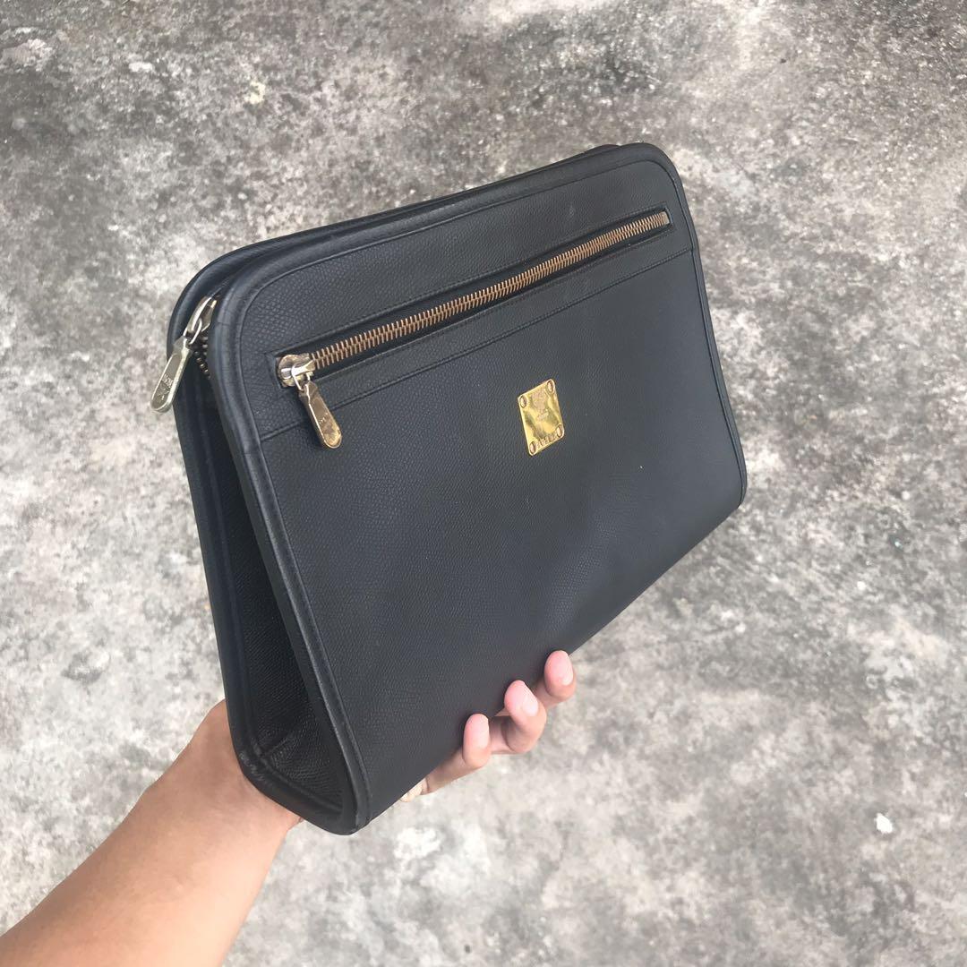 MCM Clutch Bag, Luxury, Bags & Wallets on Carousell