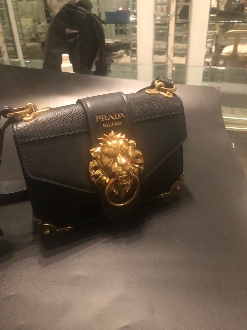 prada lion purse