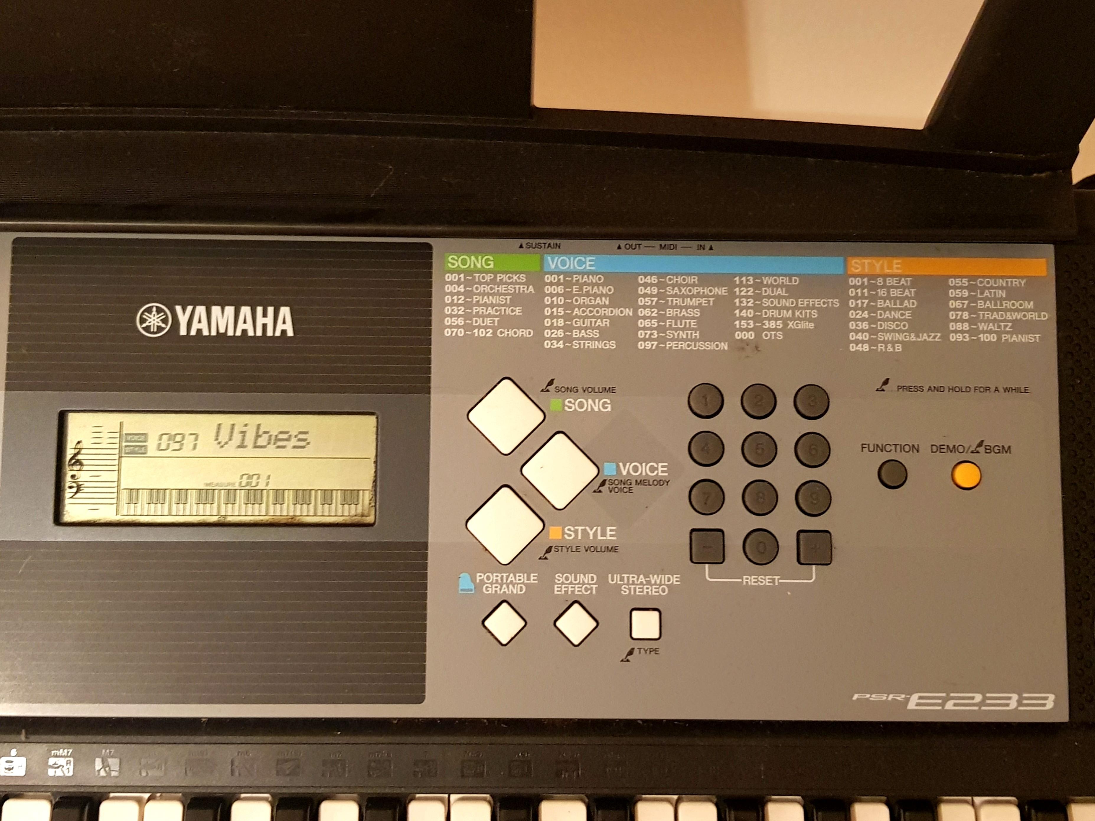 Yamaha Keyboard PSRE233 with music note holder, stand, adaptor