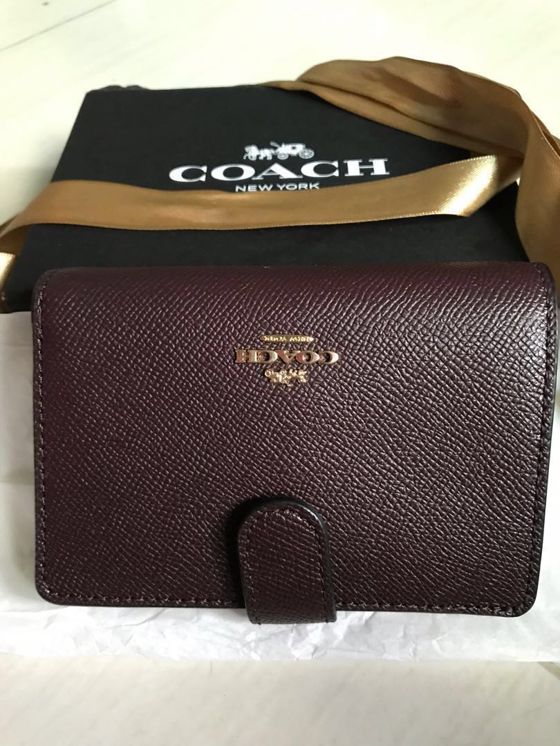 oxblood coach wallet