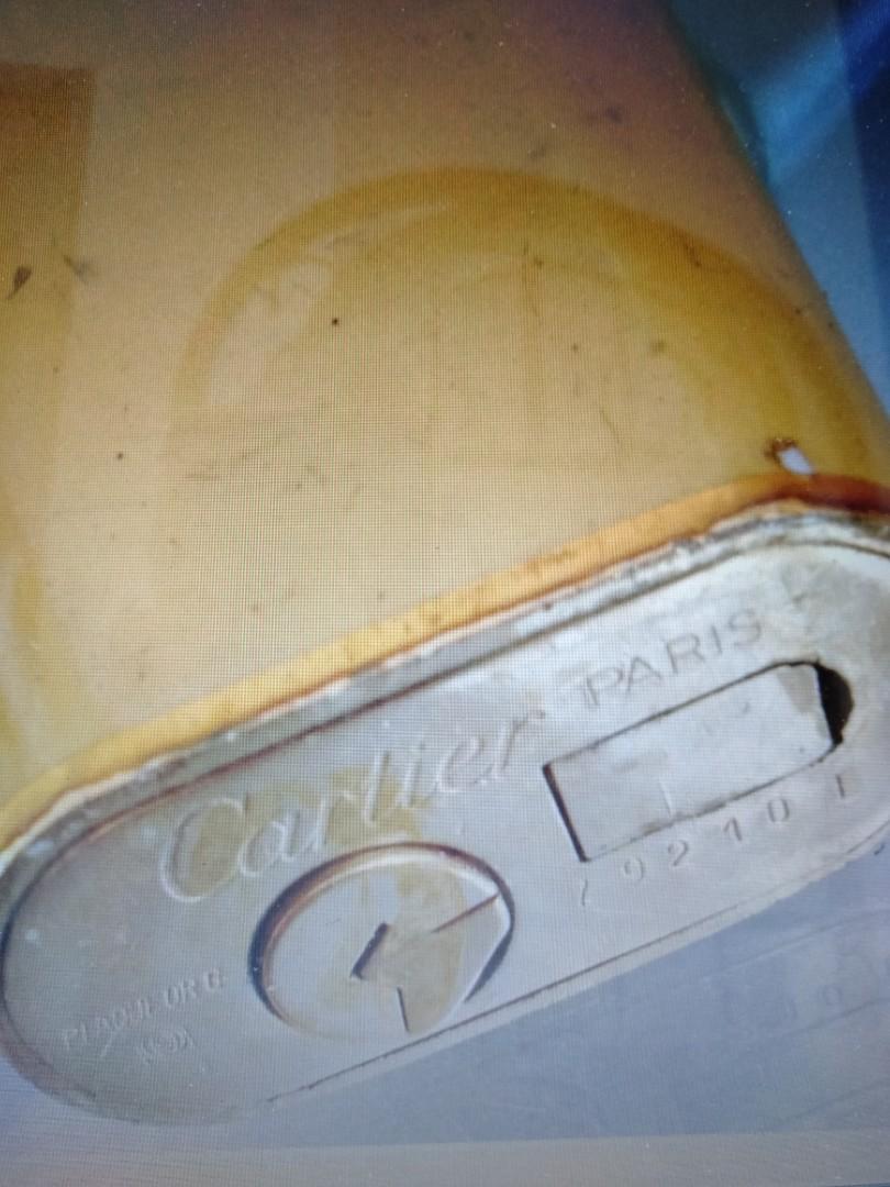 Cartier gold limned lighter (Category: Luxury Accessories) located in Manila. Submitted by mindplanets (Listing ID 217496578, Image 1). Description: Original cartier with product code number verifiable.