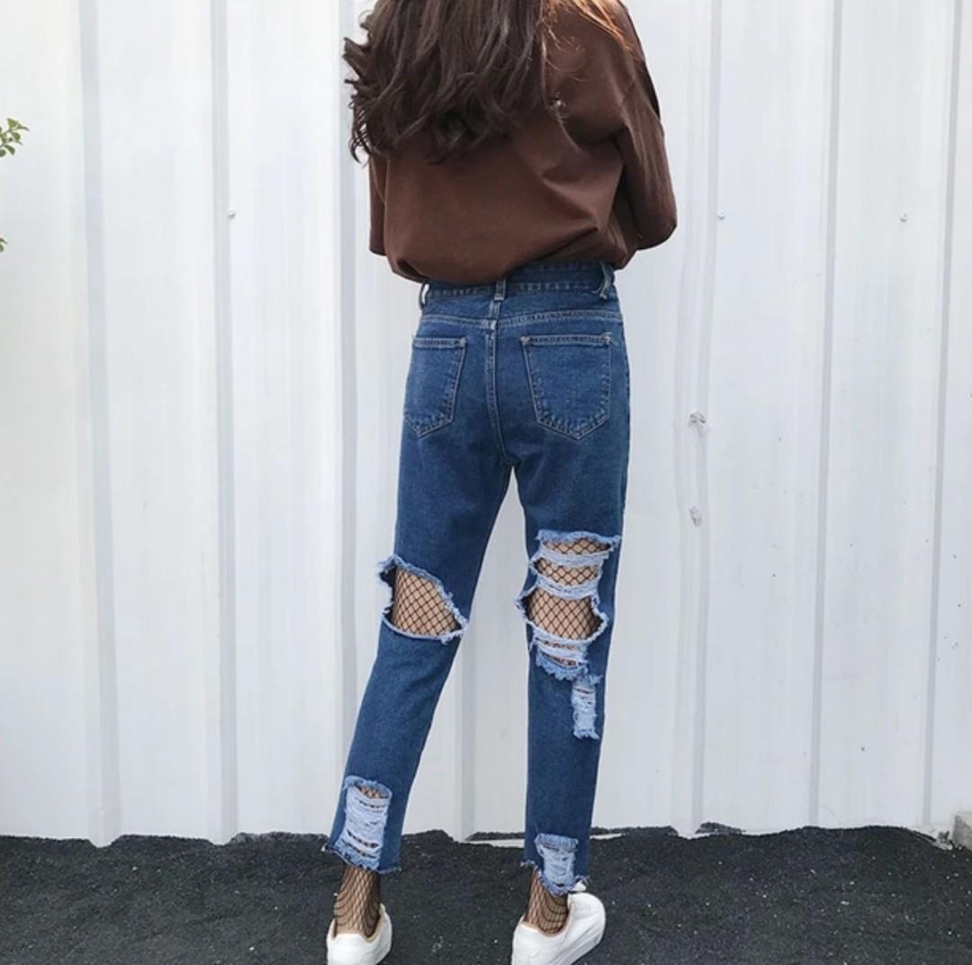 jeans ripped in the front and back