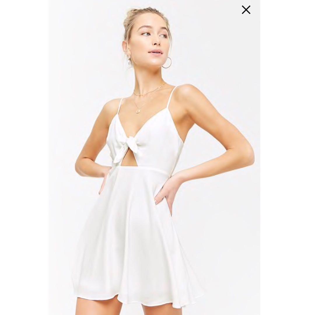 white dress with bow on front