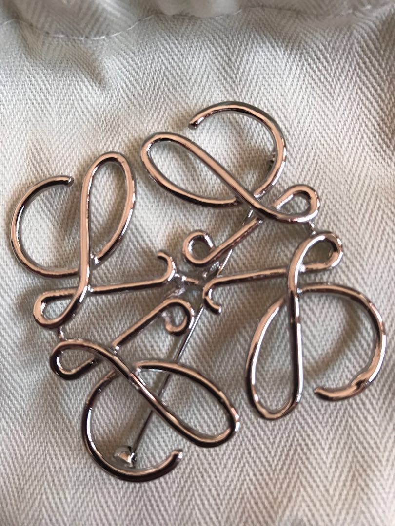 LOEWE ANAGRAM BROOCH, Women's Fashion, Watches  Accessories, Other  Accessories on Carousell