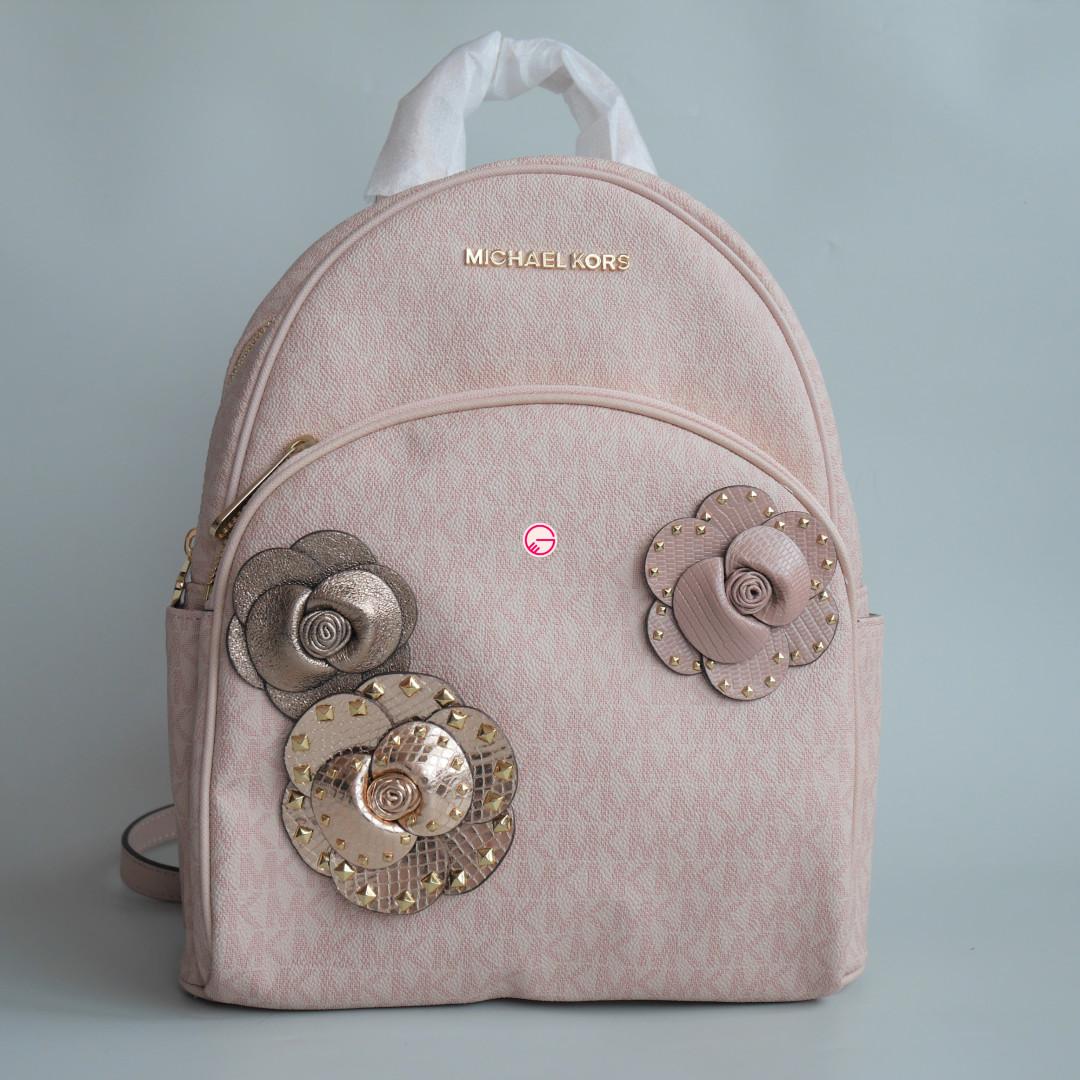 Michael kors pink backpack with outlet flowers