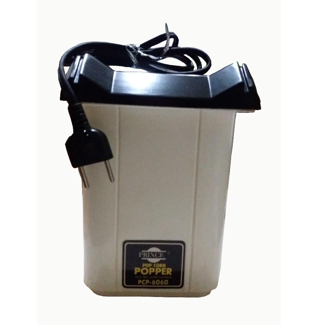 Popcorn Popper (Category: Ice-cream Makers) located in Manila. Submitted by editmes (Listing ID 217673191, Image 1). Description: PRINCE POP CORN POPPER PCP-6060 Automatic Hot Air Corn Popper For Household Use Only Up to 4 quarts No oil needed Large capacity butter cup Heat resistant base Easy to clean Portable Household use only Preloved/Old Box but item is like new but unused and functional, stocked item. See arrow for some flaws For more detai