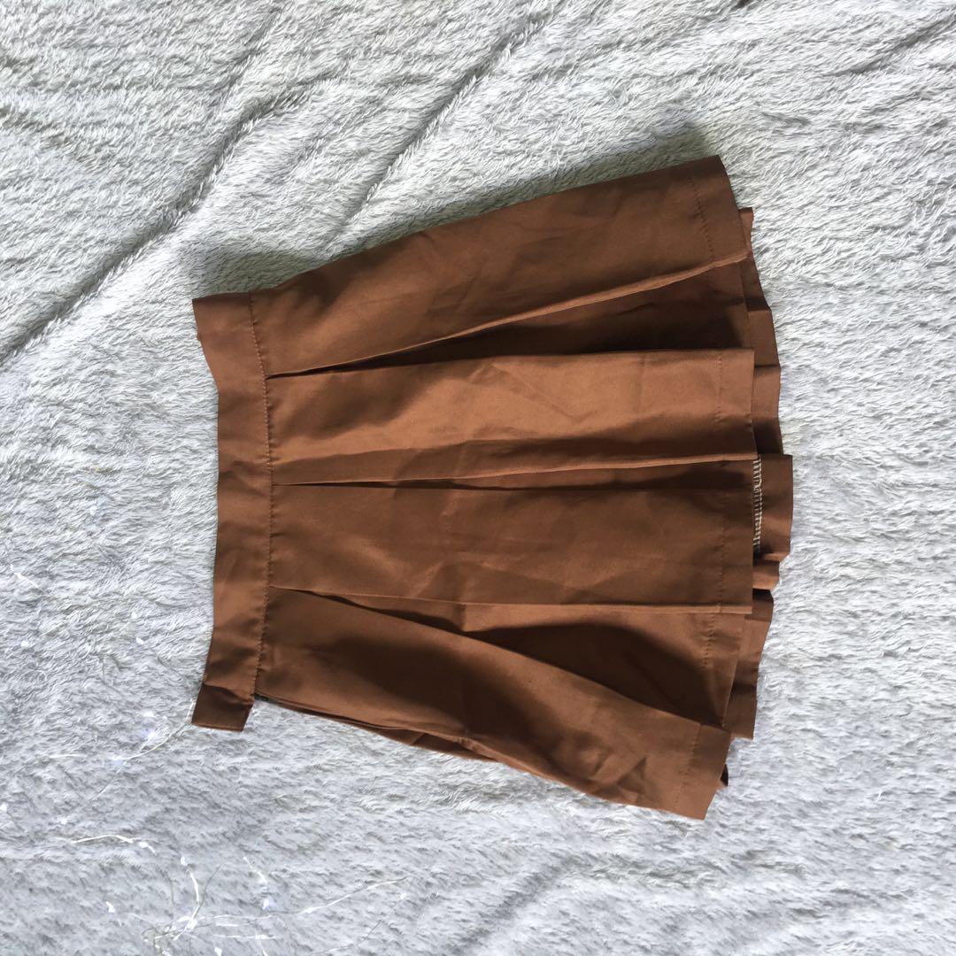 Brown satin plaid pleated skirt (Category: Skirts) located in Manila. Submitted by maaawnicaaa (Listing ID 217476397, Image 2). Description: .
