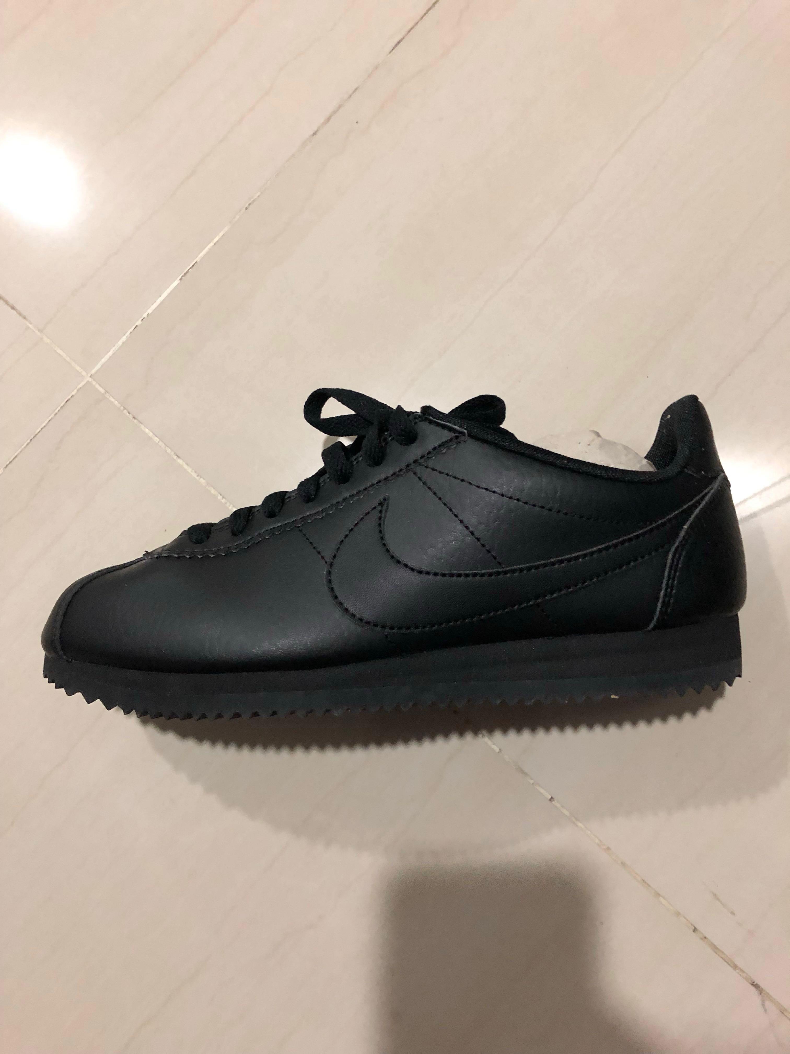 solid black nike cortez