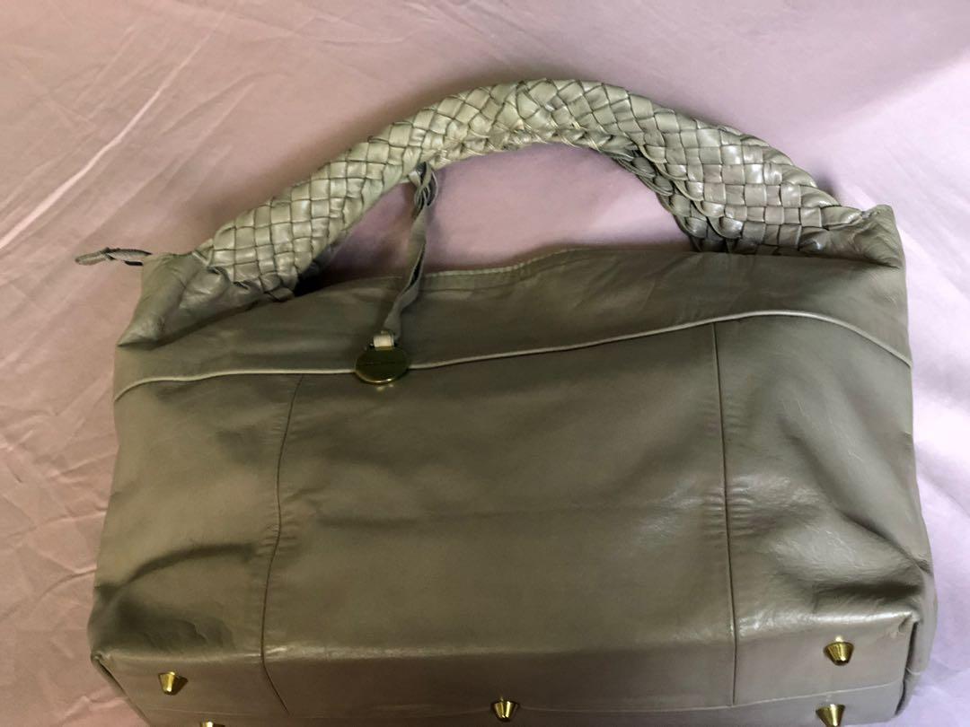 Rabeanco Leather Handbag (Category: Purses & Pouches) located in Quezon City. Submitted by pingtbl (Listing ID 218133028, Image 3). Description: Very good condition, no major flaws H- 9” W- 13” D- 4.5” Handle drop- 3” PIOG.