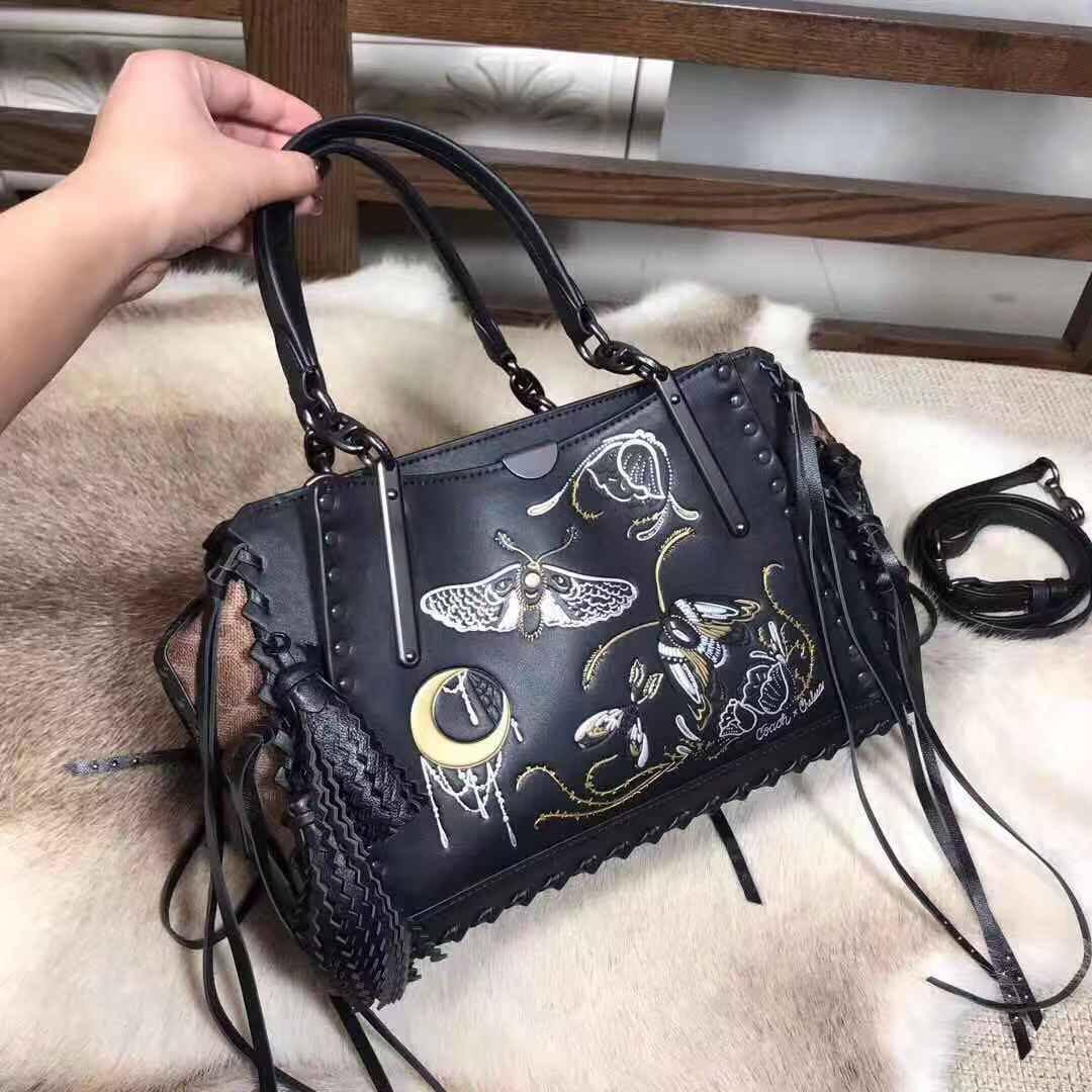 Coach dreamer in outlet signature canvas with tattoo