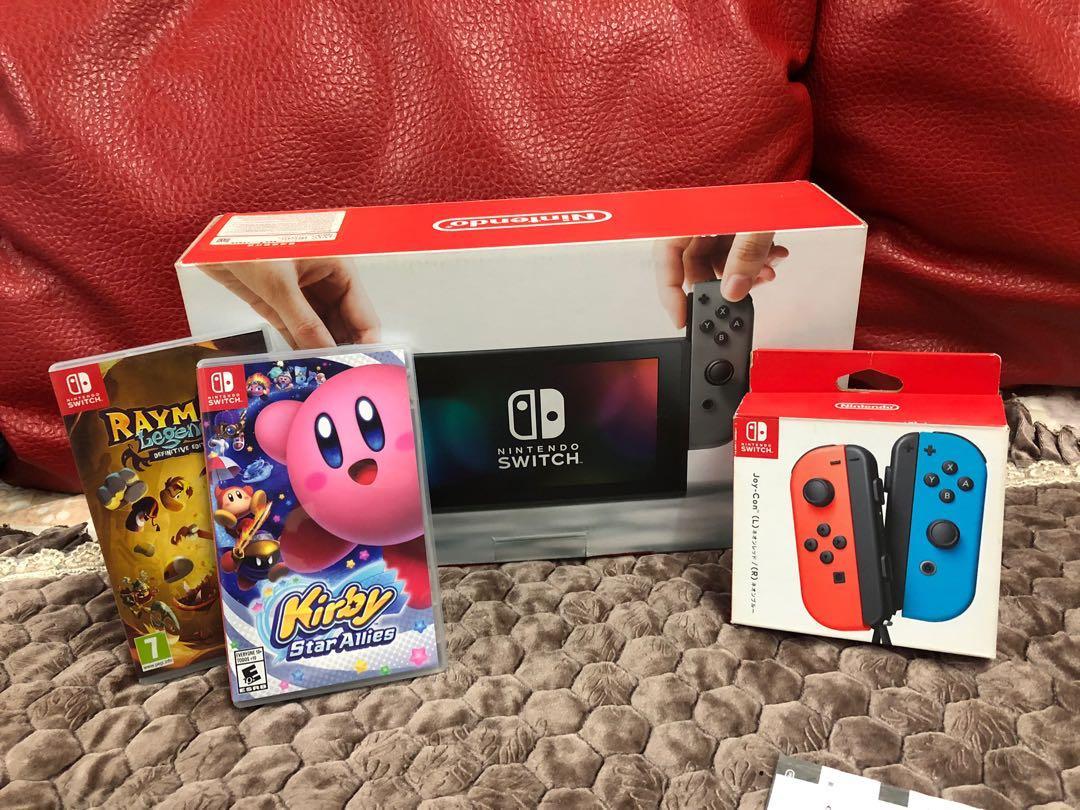 NINTENDO SWITCH （分類：Nintendo 任天堂）位於 Hong Kong。 由 lucylosze 提交（商品編號 218369513，圖片 1）。簡介： NINTENDO SWITCH 黑色FULL SET + 藍紅手制(sold out)+ 2GAMES 1:星之卡比 KIRBY STAR ALLIES 2:RAYMAN LEGENDS DEFINITIVE EDITION 95% NEW AND REAL 屯門/旺角 可小議。