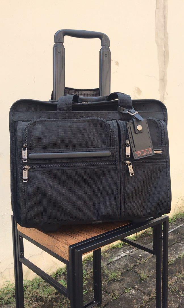 Rolling briefcase sale tumi