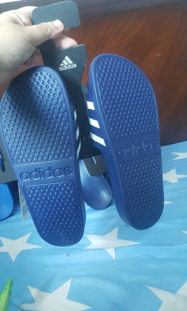 Adidas Adilette (Category: Slippers & Slides) located in Cebu City. Submitted by authenticcebu (Listing ID 218448758, Image 3). Description: ADIDAS ADILETTE Php 850 only!!!! Last Price!!! SIZE 8 - Dark Blue Limited Stocks only Pick up at Boosog Juana Osmena.