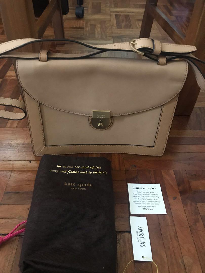 Kate Spade Saturday bag (Category: Cross-body Bags) located in Paranaque City. Submitted by superpeanut (Listing ID 218262690, Image 1). Description: Brand new with tags Beige leather Detachable strap- can also be used as a clutch Multi-way strap Clean inside and out Dimensions: 25 x 18.5 x 5 cm.