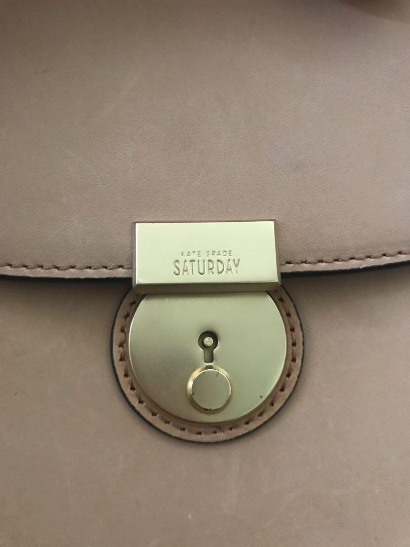 Kate Spade Saturday bag (Category: Cross-body Bags) located in Paranaque City. Submitted by superpeanut (Listing ID 218262690, Image 2). Description: Brand new with tags Beige leather Detachable strap- can also be used as a clutch Multi-way strap Clean inside and out Dimensions: 25 x 18.5 x 5 cm.