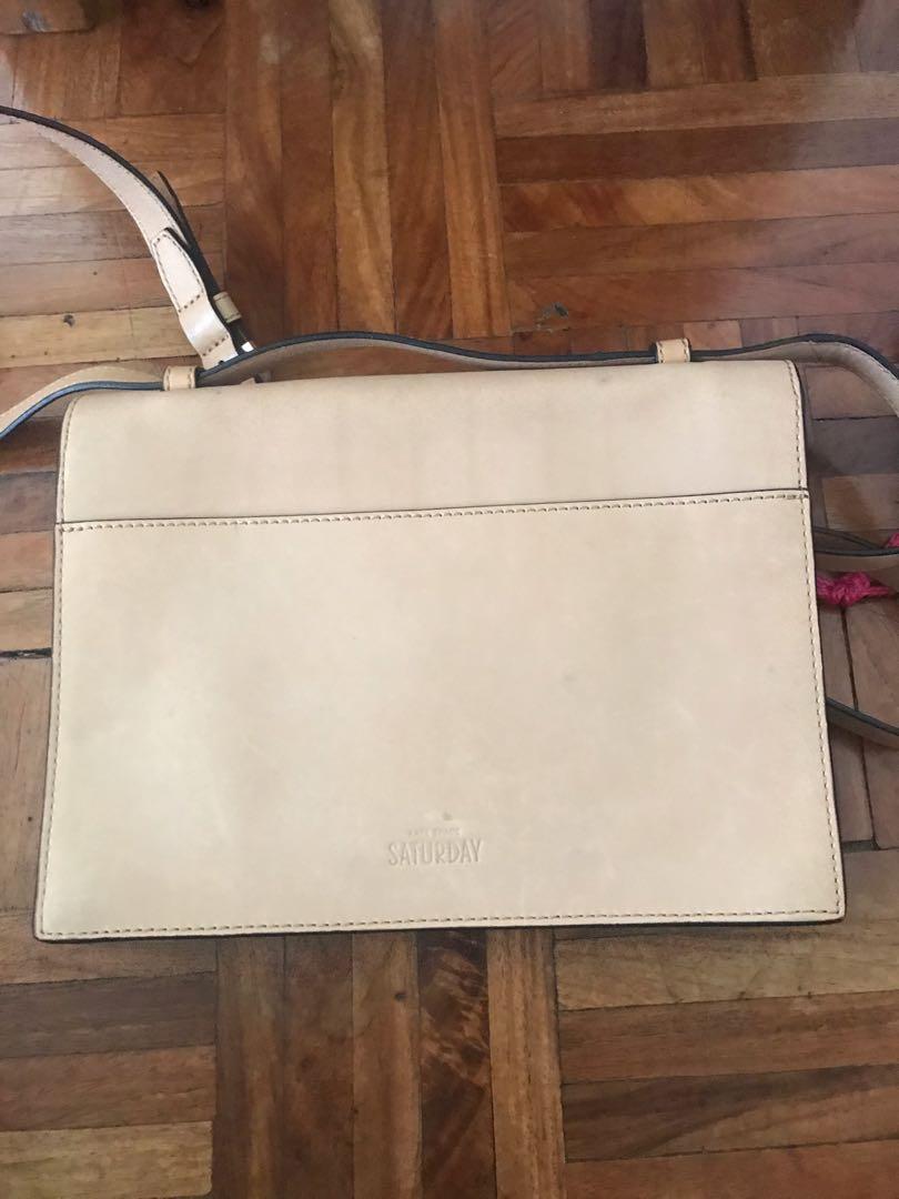 Kate Spade Saturday bag (Category: Cross-body Bags) located in Paranaque City. Submitted by superpeanut (Listing ID 218262690, Image 3). Description: Brand new with tags Beige leather Detachable strap- can also be used as a clutch Multi-way strap Clean inside and out Dimensions: 25 x 18.5 x 5 cm.