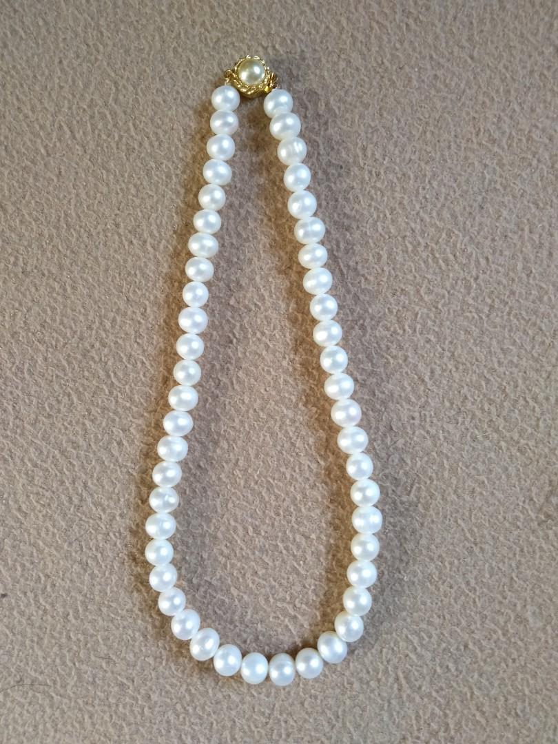 Natural Fresh Water Pearls Necklace (Category: Bracelets) located in Manila. Submitted by bargainoutlet (Listing ID 218416151, Image 2). Description: Approximately 16" in length. With gold plated lock. Never been used. Been kept for a long time, the lock did not tarnish..