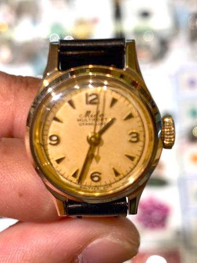 Gold top mido watch