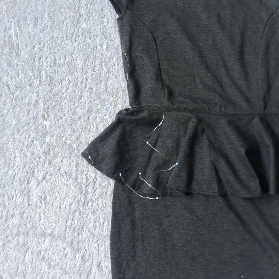 Charcoal Peplum Dress (Category: Dresses) located in Manila. Submitted by maaawnicaaa (Listing ID 218646190, Image 2). Description: Hello I’m selling peplum dress :) used it once for a photoshoot and I got it originally for 800php I’m an instgrammer and I’m currently clearing out my closet so do check out my page for more 💖🤗.