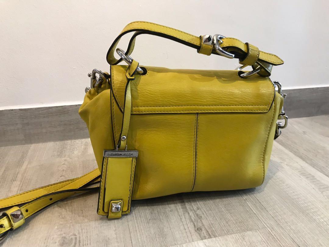 Karen Millen women s yellow mini Satchel with enamel turnlock lemon yellow sling bag with chain