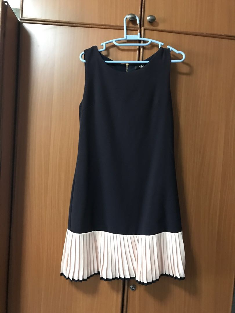 dress with pleats at the bottom