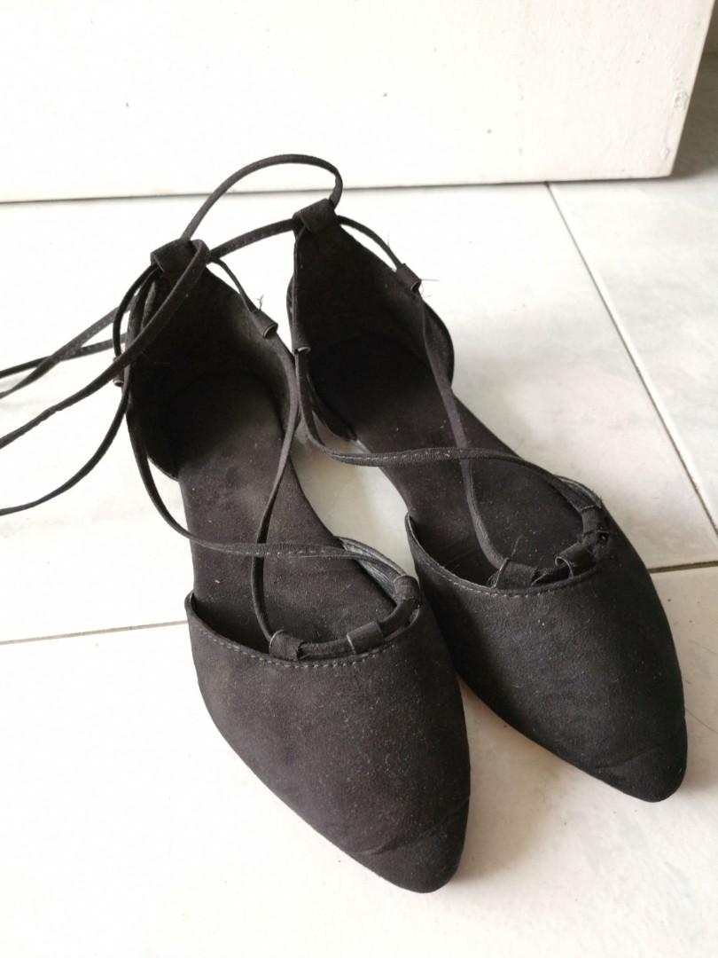 black flats with strings