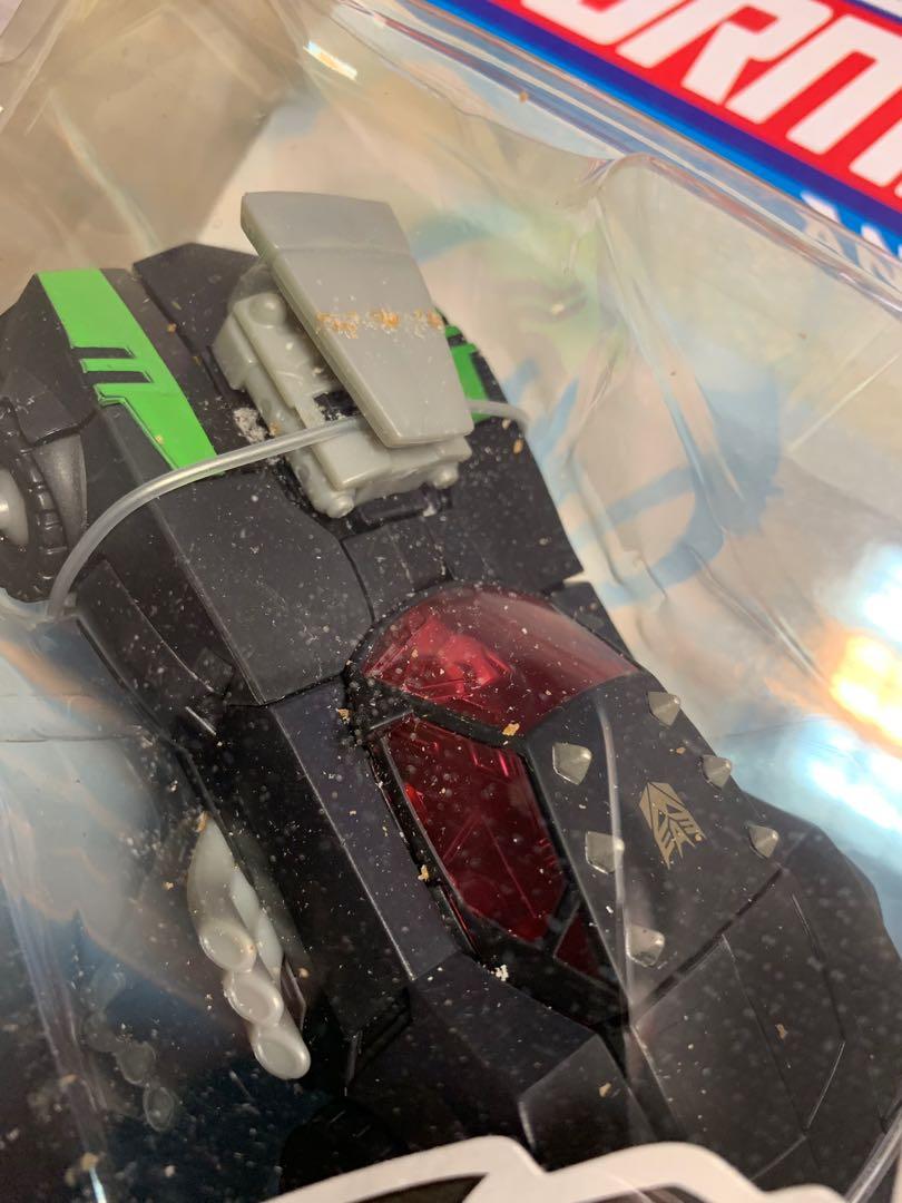 Transformers Animated Lockdown (Category: Toy Figures) located in Singapore. Submitted by fillan (Listing ID 218615234, Image 3). Description: Lockdown, the villain bounty hunter from Transformers Animated series. MOSC. Overall good condition. The brown “dust” you see inside the packaging is due to the rubber bands disintegrating over the years and can be cleaned. Plastic window slight yellow from age and a small crease at top of packaging. Pls s