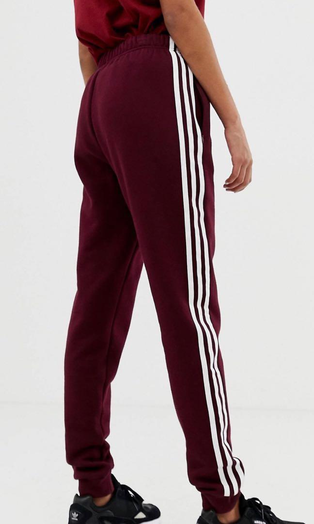 adidas originals three stripe track pants in burgundy