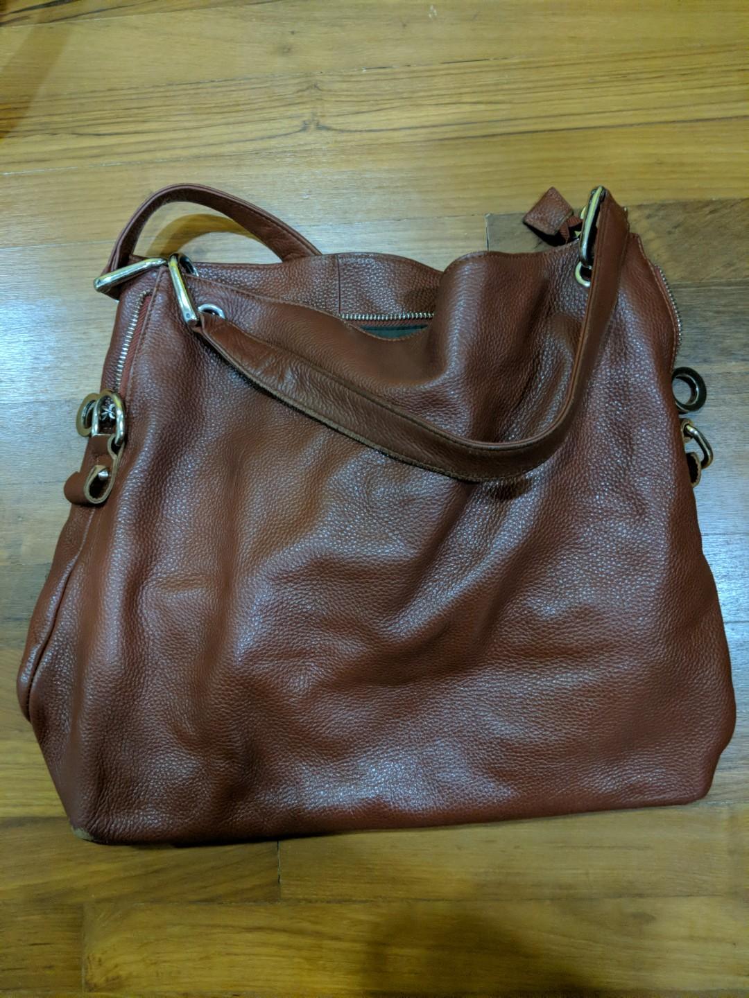 jon louis sling bag