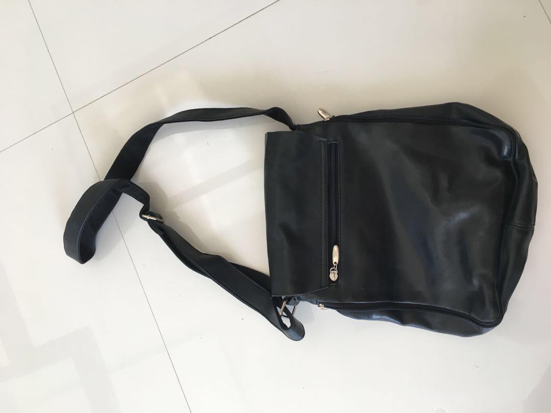 Black Leather Messenger Bag (Category: Cross-body Bags) located in Makati City. Submitted by kdn_corner (Listing ID 160061078, Image 2). Description: #march300.