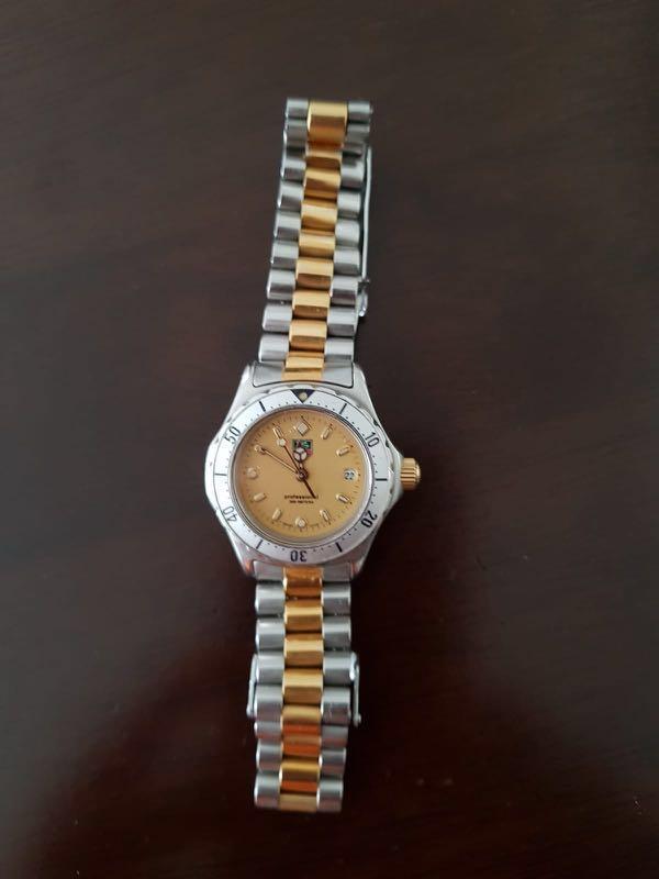 Tag Heuer ladies watch classic gold and silver tone watch. TAG
